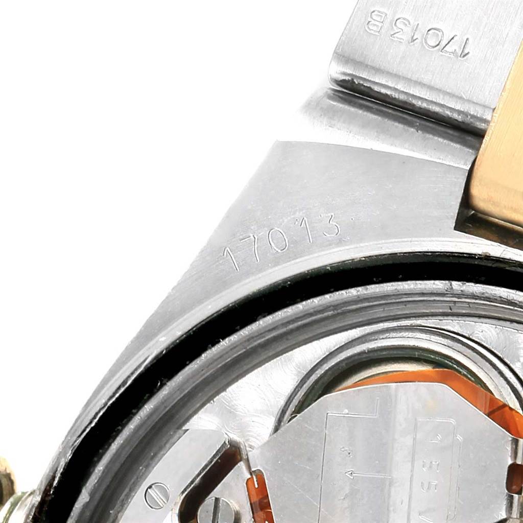 The image shows a close-up view of the case back of a Rolex Oysterquartz 17013 Men
s Stainless Steel Black Dial 17013 Men
s Stainless Steel Black Dial watch with model number 17013.