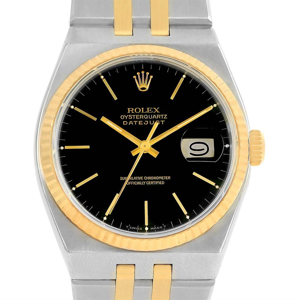 The image shows a front view of the Rolex Oysterquartz 17013 Men
s Stainless Steel Black Dial 17013 Men
s Stainless Steel Black Dial Datejust watch, highlighting the black dial, gold fluted bezel, and two-tone bracelet.