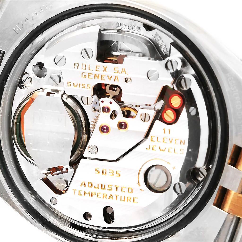 The image shows the inner mechanism and movement of a Rolex Oysterquartz 17013 Men
s Stainless Steel Black Dial 17013 Men
s Stainless Steel Black Dial watch, highlighting the intricate components and jewels.