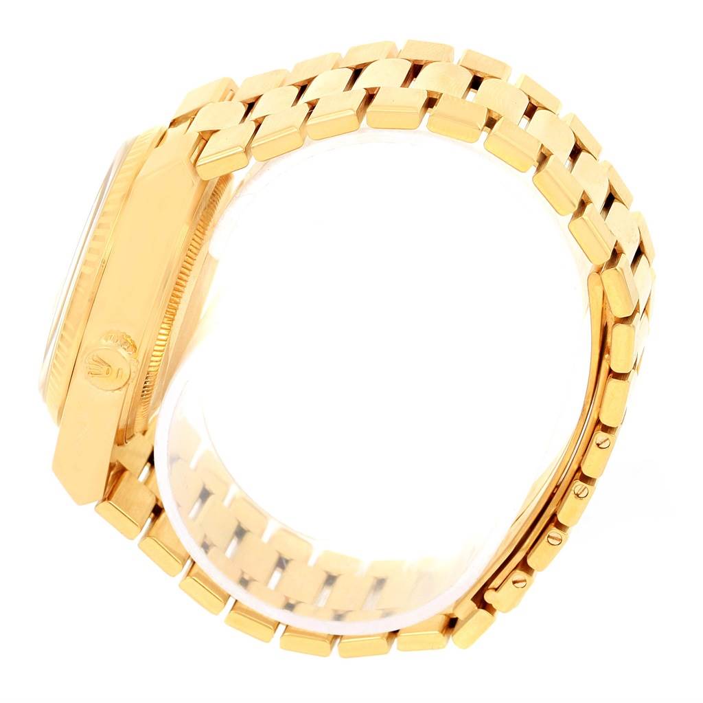 The image shows a side angle of a gold Rolex Oysterquartz 19018 Men's Stainless Steel Brown Dial 19018 Men's Stainless Steel Brown Dial watch, focusing on the case and bracelet.