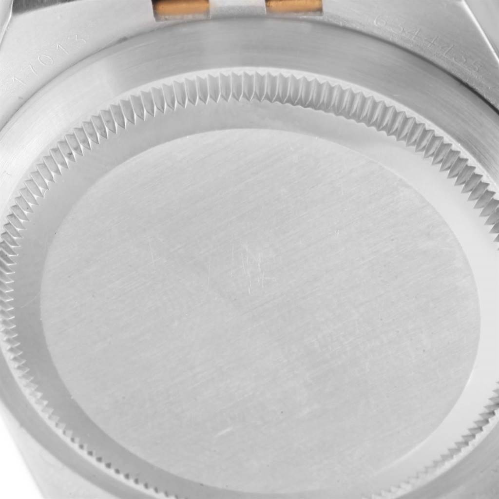 The image shows the case back of the Rolex Oysterquartz 17013 Men
s Stainless Steel White Dial 17013 Men
s Stainless Steel White Dial model from a top-down angle.