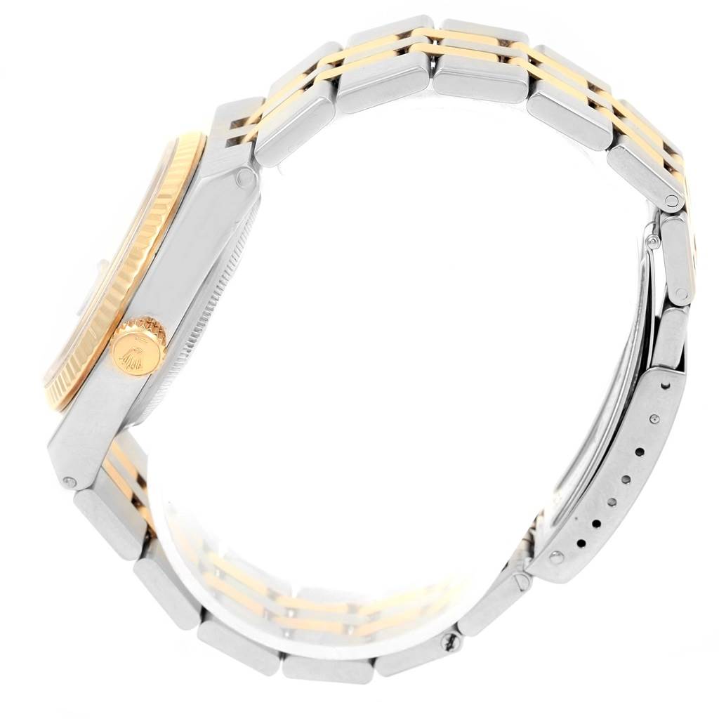 This image shows a side profile of a Rolex Oysterquartz 17013 Men
s Stainless Steel White Dial 17013 Men
s Stainless Steel White Dial watch, highlighting the watch case, crown, and metal bracelet.