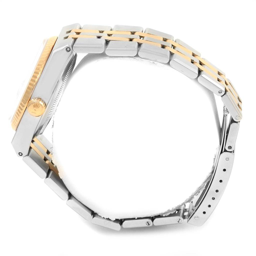 The image shows a side view of a Rolex Oysterquartz 17013 Men's Stainless Steel White Dial 17013 Men's Stainless Steel White Dial watch, highlighting the case, bezel, crown, and bracelet.