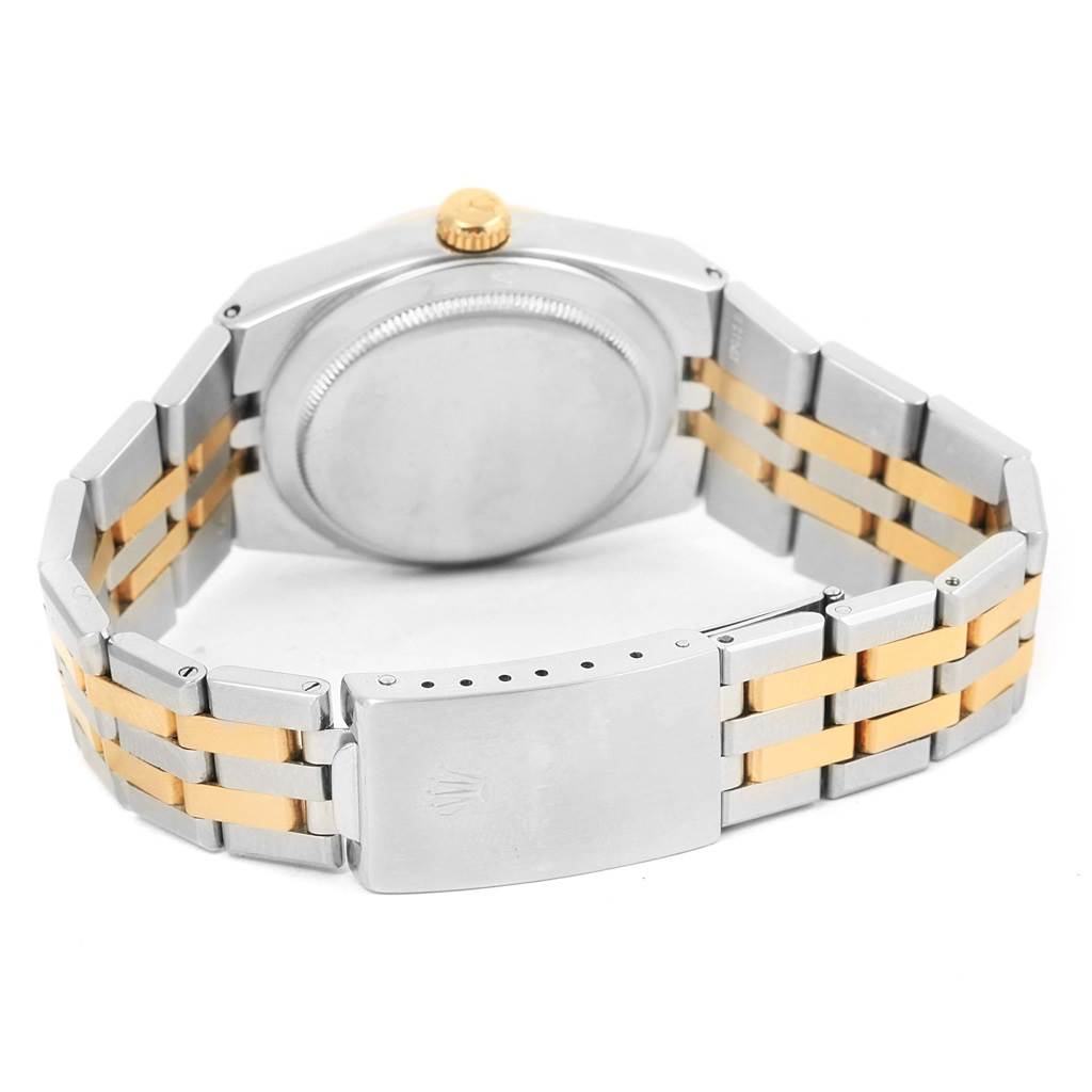 The image shows the back view of a Rolex Oysterquartz 17013 Men's Stainless Steel White Dial 17013 Men's Stainless Steel White Dial watch, highlighting the case back, crown, and two-tone bracelet with clasp.