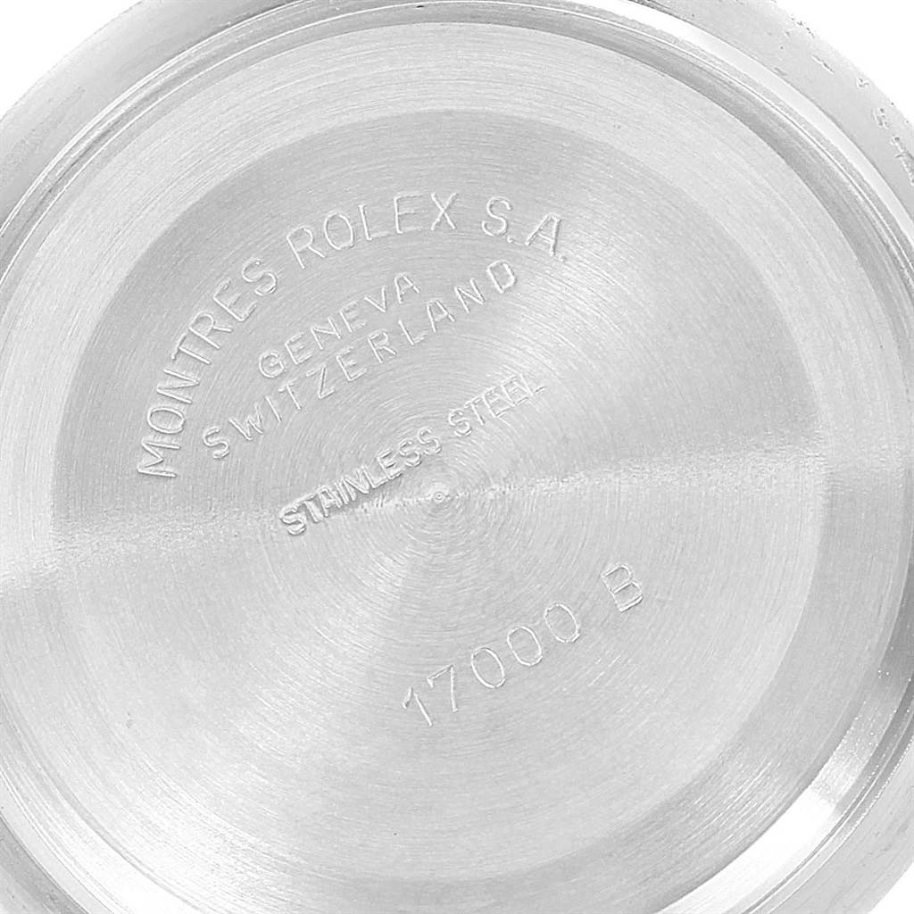 The image shows the back case of a Rolex Oysterquartz 17013 Men's Stainless Steel White Dial 17013 Men's Stainless Steel White Dial watch, engraved with model details.