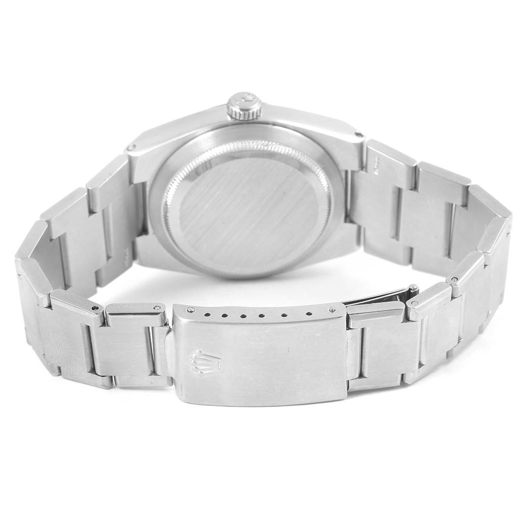 The image shows the back view of the Rolex Oysterquartz 17000 Men
s Stainless Steel Black Dial 17000 Men
s Stainless Steel Black Dial watch, focusing on the case back and the bracelet clasp.