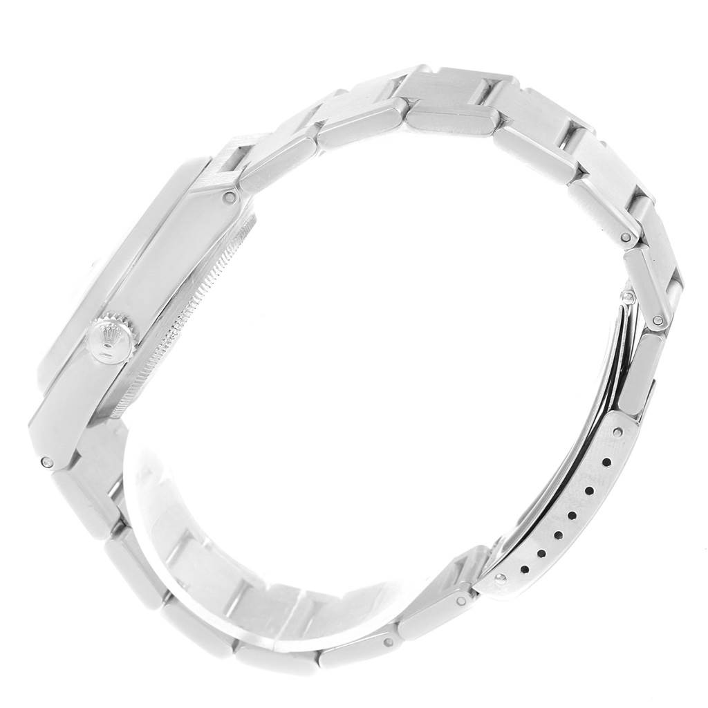 The image shows a side profile of a Rolex Oysterquartz 17000 Men
s Stainless Steel Black Dial 17000 Men
s Stainless Steel Black Dial watch, highlighting the bracelet and crown.