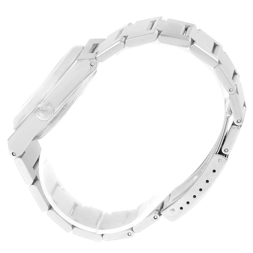 This image shows a side view of the Rolex Oysterquartz 17000 Men's Stainless Steel White Dial 17000 Men's Stainless Steel White Dial, highlighting the case, crown, and bracelet.