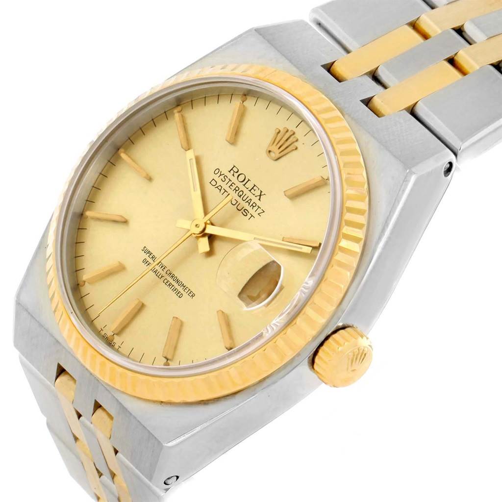 The Rolex Oysterquartz 17013 Men's Stainless Steel Champagne Dial 17013 Men's Stainless Steel Champagne Dial watch is shown from an angled close-up view, highlighting the dial, bezel, crown, and part of the bracelet.