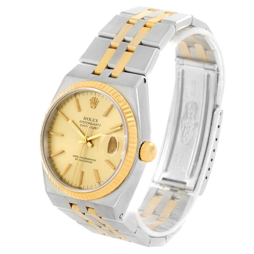 The Rolex Oysterquartz 17013 Men's Stainless Steel Champagne Dial 17013 Men's Stainless Steel Champagne Dial watch is shown at a three-quarter angle, displaying its face, bezel, crown, and bracelet.