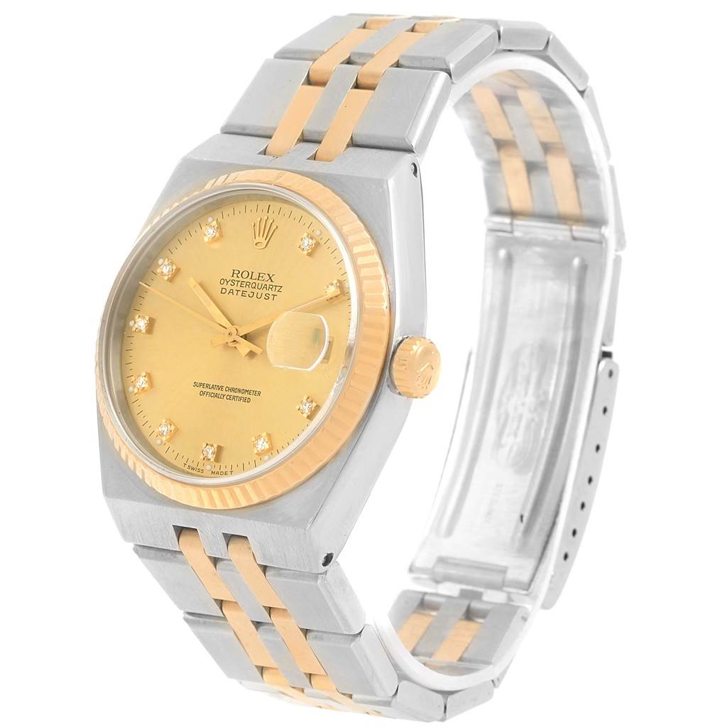 The Rolex Oysterquartz 17013 Men
s Stainless Steel Champagne Dial 17013 Men
s Stainless Steel Champagne Dial Datejust watch is displayed at a three-quarter angle, showing the face, bezel, and bracelet.