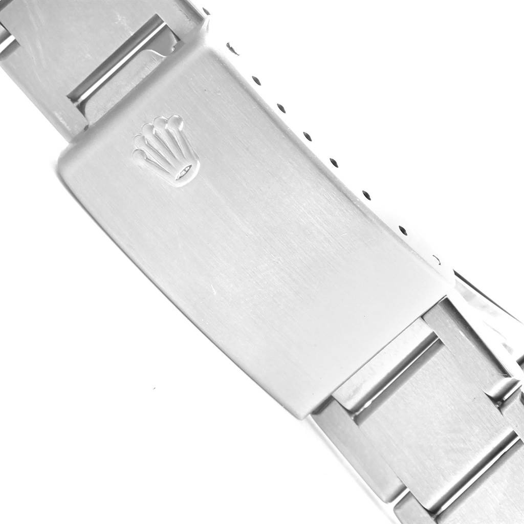 The image shows a close-up of the clasp on a Rolex Oysterquartz 17000 Men's Stainless Steel White Dial 17000 Men's Stainless Steel White Dial watch bracelet, featuring the Rolex logo.