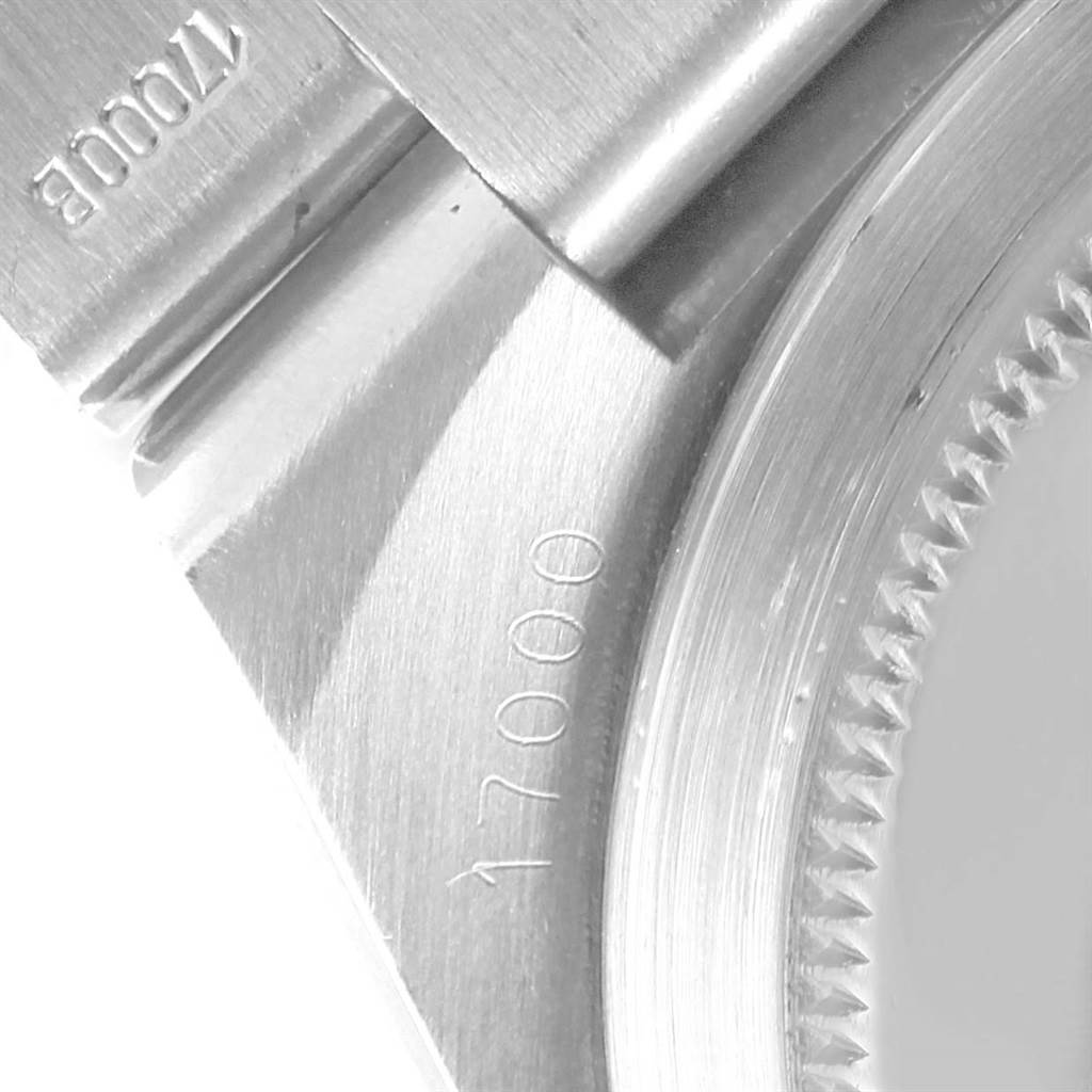 This image shows a close-up of the lug and part of the bezel with the engraved model number of a Rolex Oysterquartz 17000 Men's Stainless Steel Black Dial 17000 Men's Stainless Steel Black Dial watch.
