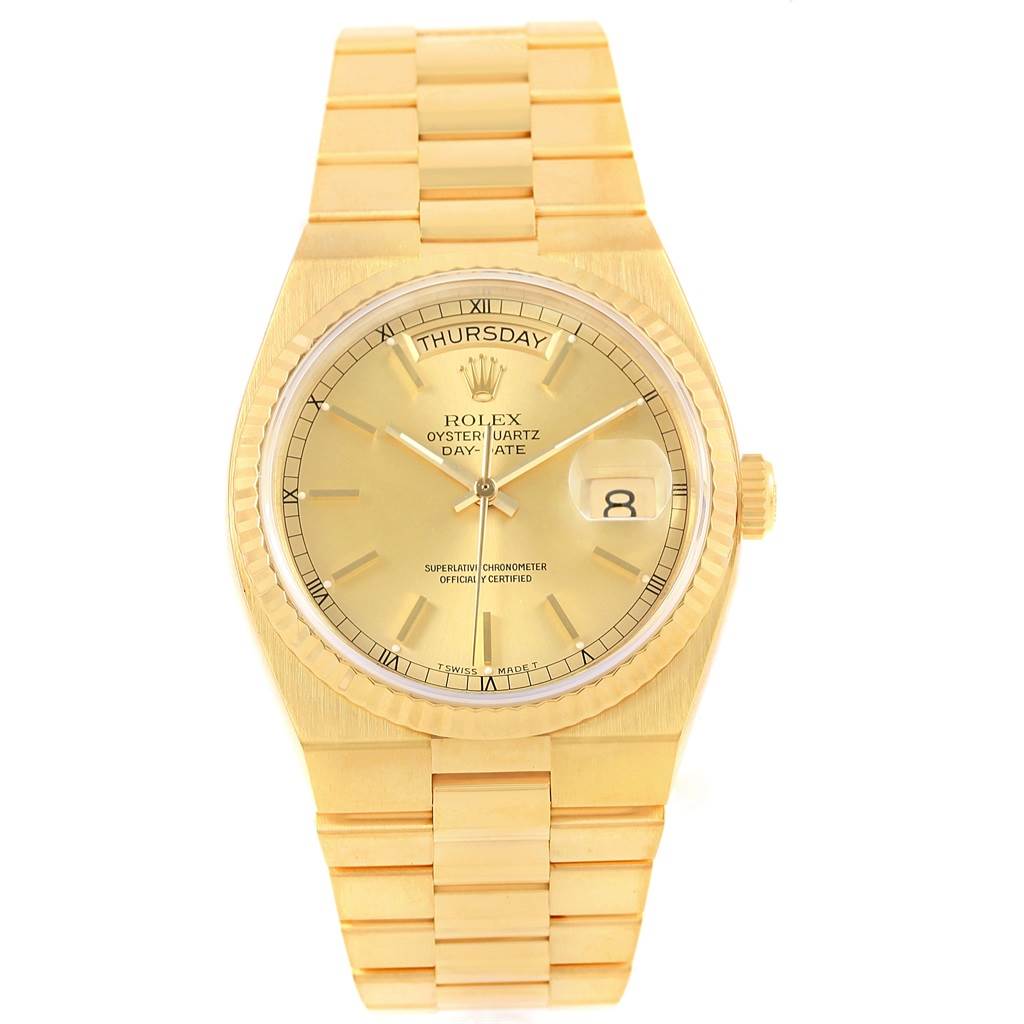 The image shows a Rolex Oysterquartz 19018 Men's Yellow Gold Champagne Dial 19018 Men's Yellow Gold Champagne Dial Day-Date watch from a front angle, displaying the dial, bracelet, and clasp.