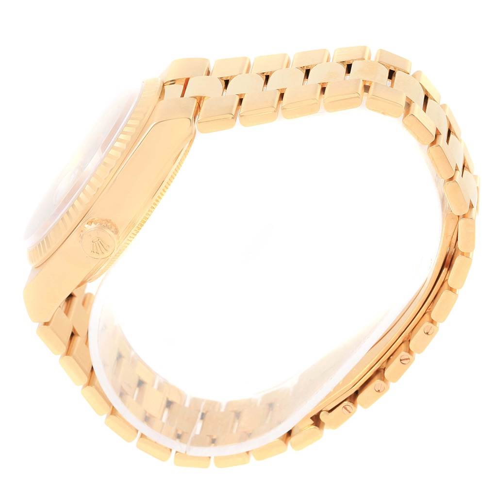 The image shows a side profile view of a Rolex Oysterquartz 19018 Men's Yellow Gold Champagne Dial 19018 Men's Yellow Gold Champagne Dial watch, highlighting the crown and bracelet.