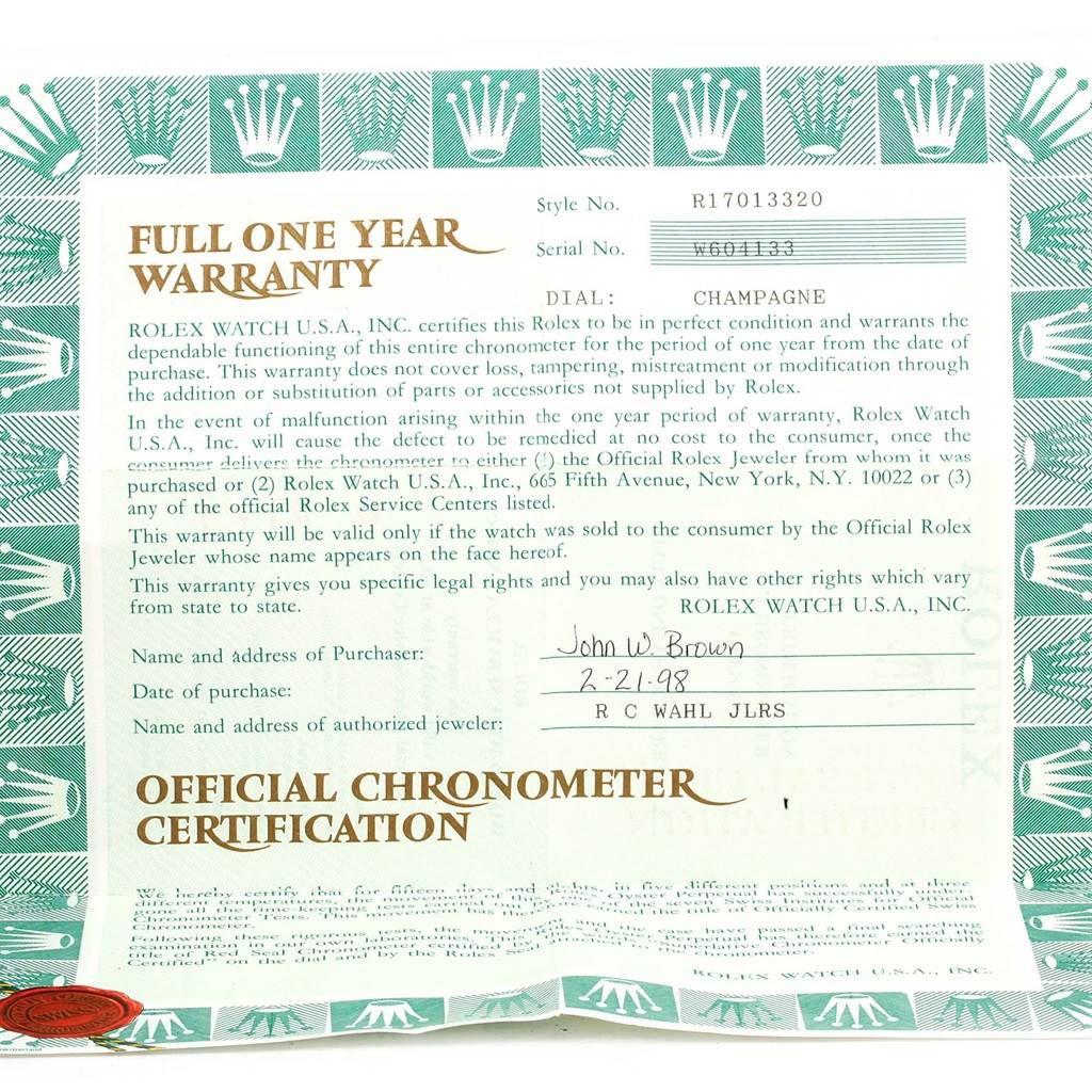 This image shows the warranty card for the Rolex Oysterquartz 17013 Men's Stainless Steel Champagne Dial 17013 Men's Stainless Steel Champagne Dial model, including details like style and serial number.