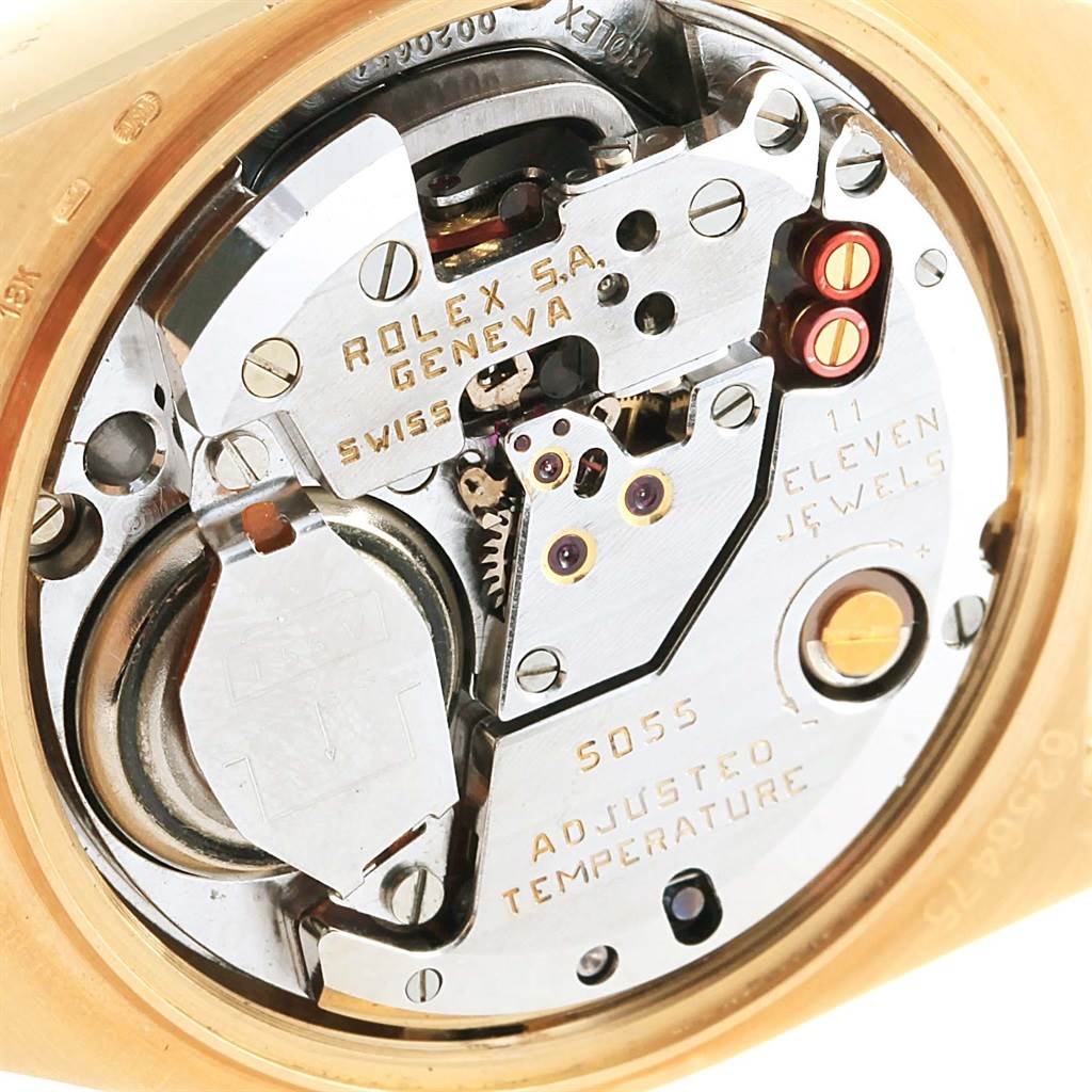 This image shows a close-up of the movement and internal components of a Rolex Oysterquartz 19018 Men's Yellow Gold Black Dial 19018 Men's Yellow Gold Black Dial watch.