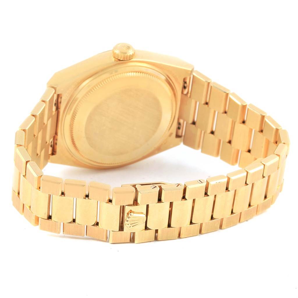 The image shows the back and side profile of the gold Rolex Oysterquartz 19018 Men's Yellow Gold Black Dial 19018 Men's Yellow Gold Black Dial watch, highlighting the case back and integrated bracelet.