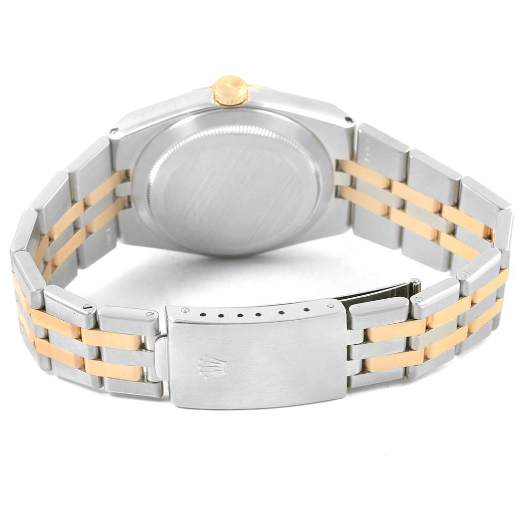 The image shows the case back, crown, and bracelet of the Rolex Oysterquartz 17013 Men's Stainless Steel Champagne Dial 17013 Men's Stainless Steel Champagne Dial watch from a rear angle.