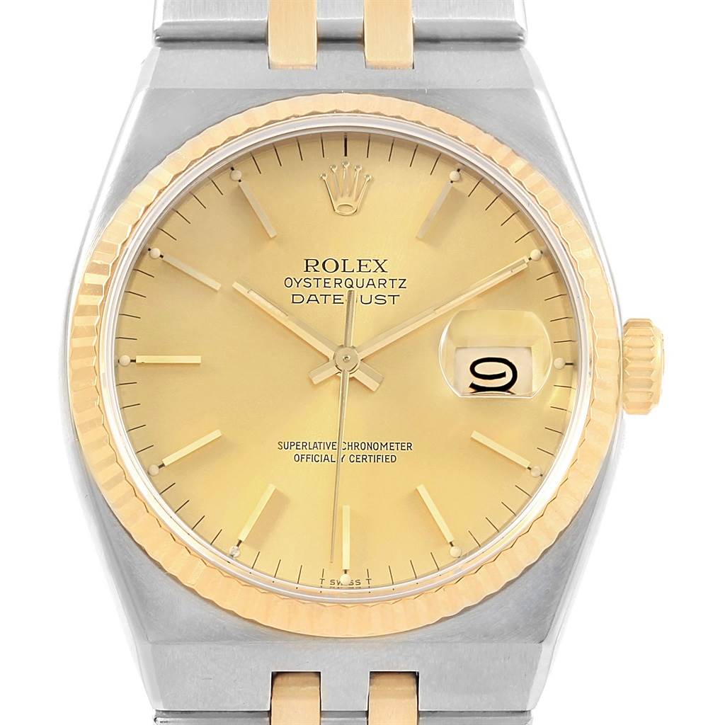This Rolex Oysterquartz 17013 Men's Stainless Steel Champagne Dial 17013 Men's Stainless Steel Champagne Dial model is shown from the front, highlighting the dial, hands, date display, bezel, and part of the bracelet.