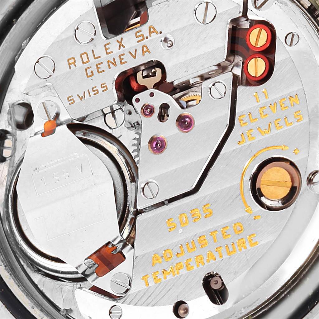 The image shows a close-up of the movement parts of a Rolex Oysterquartz 17013 Men
s Stainless Steel Blue Dial 17013 Men
s Stainless Steel Blue Dial model watch, highlighting the intricate mechanism.