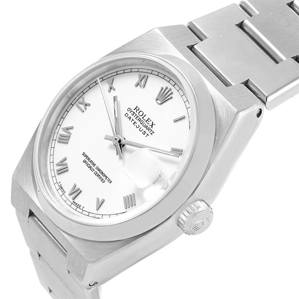 The image shows a close-up, angled view of a Rolex Oysterquartz 17000 Men's Stainless Steel White Dial 17000 Men's Stainless Steel White Dial Datejust watch, highlighting its dial, crown, and part of the bracelet.