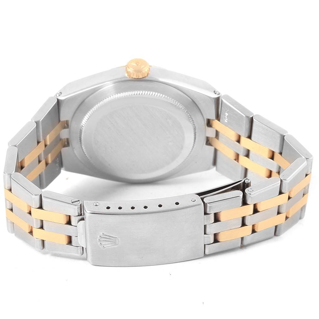 This image shows the back, clasp, and bracelet of a Rolex Oysterquartz 17013 Men
s Steel and Gold (two tone) Blue Dial 17013 Men
s Steel and Gold (two tone) Blue Dial watch at an angled view.