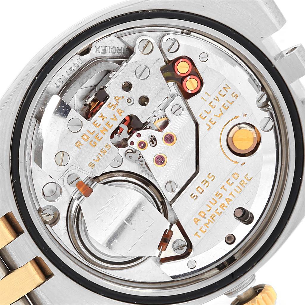 The image shows the internal mechanism and movement of a Rolex Oysterquartz 17013 Men
s Steel and Gold (two tone) Blue Dial 17013 Men
s Steel and Gold (two tone) Blue Dial watch.