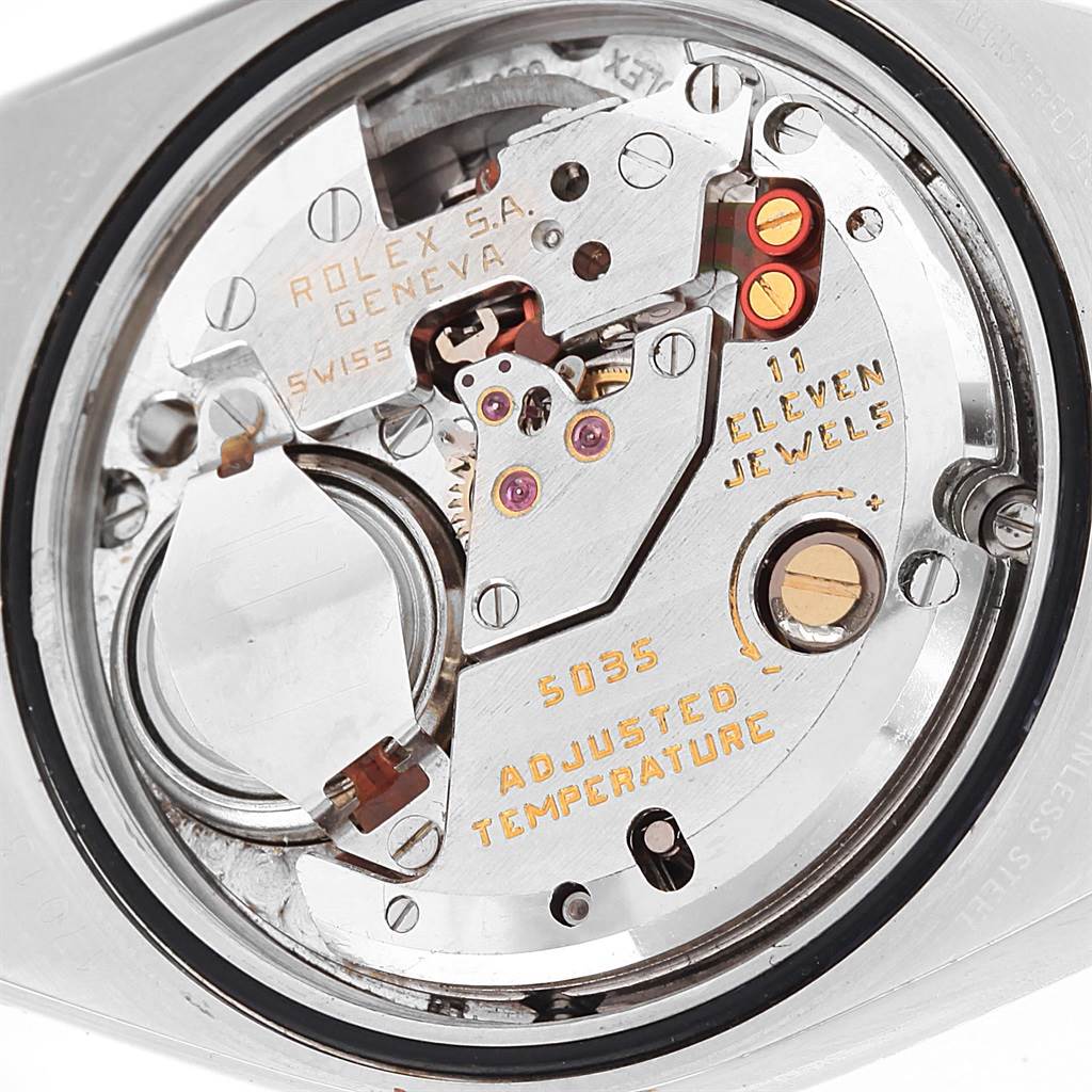 The image shows the internal movement and components of a Rolex Oysterquartz 17013 Men's Stainless Steel Champagne Dial 17013 Men's Stainless Steel Champagne Dial watch from a rear angle.
