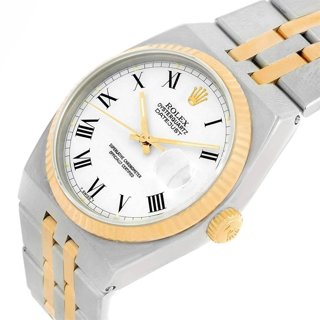 The image shows a Rolex Oysterquartz 17013 Men's Steel and Gold (two tone) White Dial 17013 Men's Steel and Gold (two tone) White Dial watch from a diagonal angle, highlighting its dial, bezel, and part of the bracelet.