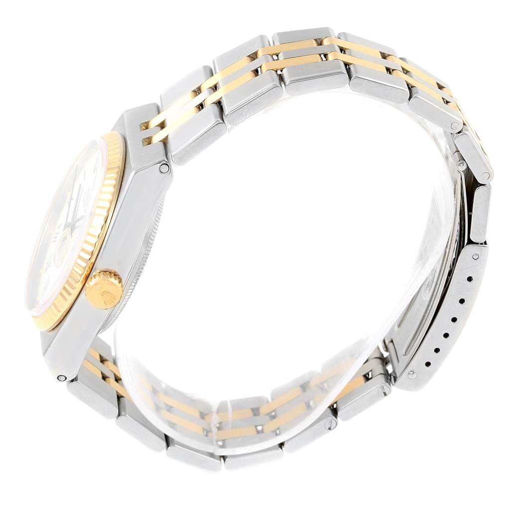 The image shows a side view of a Rolex Oysterquartz 17013 Men's Steel and Gold (two tone) White Dial 17013 Men's Steel and Gold (two tone) White Dial watch, highlighting its two-tone bracelet and crown.