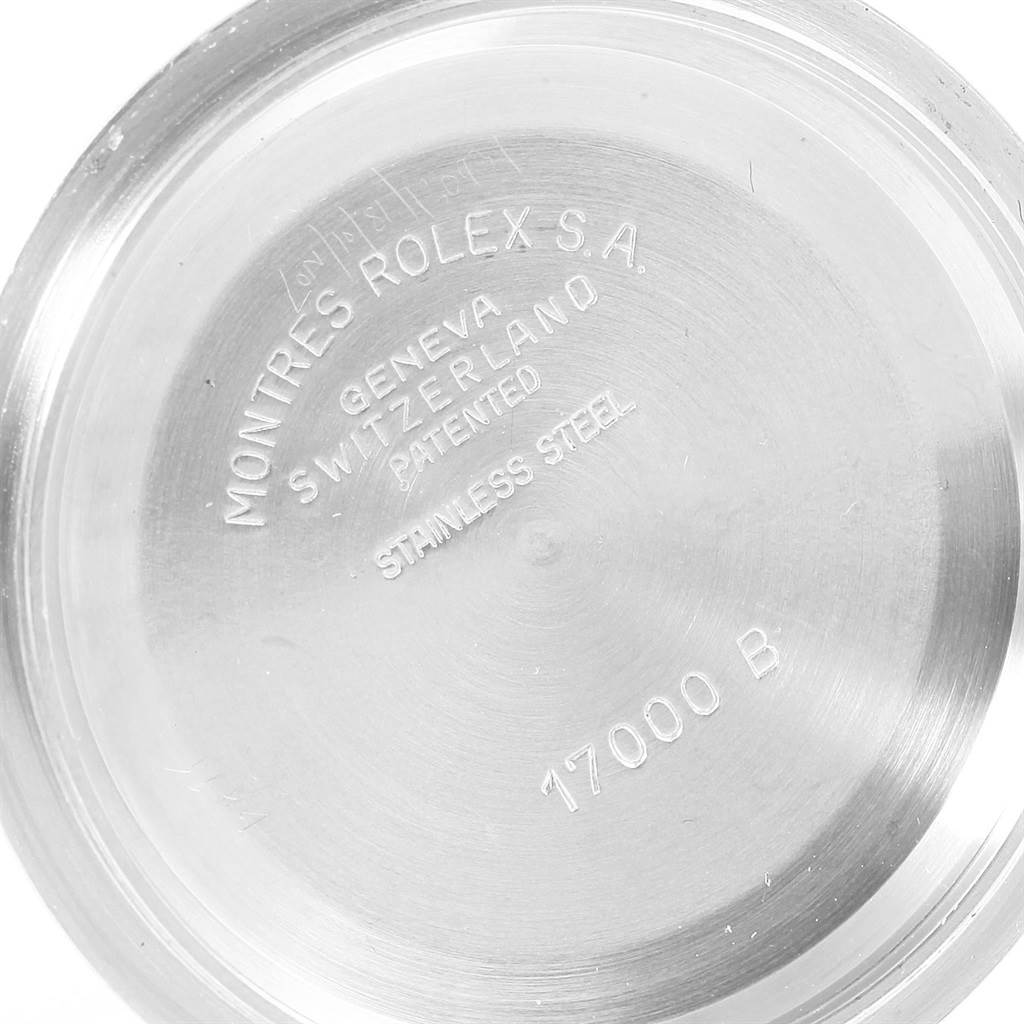 The image shows the case back of a Rolex Oysterquartz 17013 Men's Steel and Gold (two tone) White Dial 17013 Men's Steel and Gold (two tone) White Dial model, displaying various engraved details.