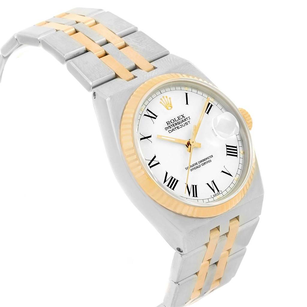 The Rolex Oysterquartz 17013 Men's Steel and Gold (two tone) White Dial 17013 Men's Steel and Gold (two tone) White Dial watch is shown at a slight angle, displaying the dial, bezel, crown, and two-tone bracelet.