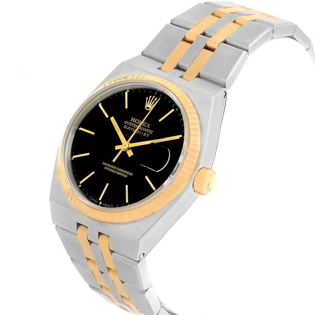 The image shows a Rolex Oysterquartz 17013 Men's Stainless Steel Black Dial 17013 Men's Stainless Steel Black Dial watch from a slight side angle, highlighting the black dial, gold bezel, and two-tone bracelet.