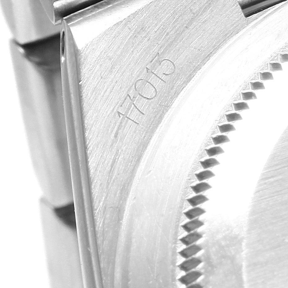 The image shows a close-up angle of the Rolex Oysterquartz 17013 Men's Stainless Steel Black Dial 17013 Men's Stainless Steel Black Dial 17013 model, focusing on the case and part of the bracelet.