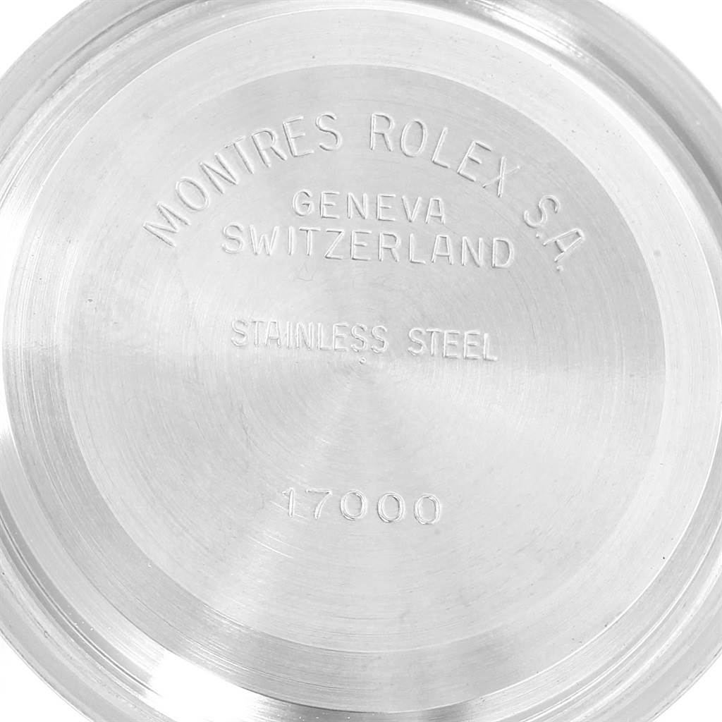 The image shows the back case of a Rolex Oysterquartz 17013 Men's Stainless Steel Black Dial 17013 Men's Stainless Steel Black Dial watch, displaying the brand, model, and material information.