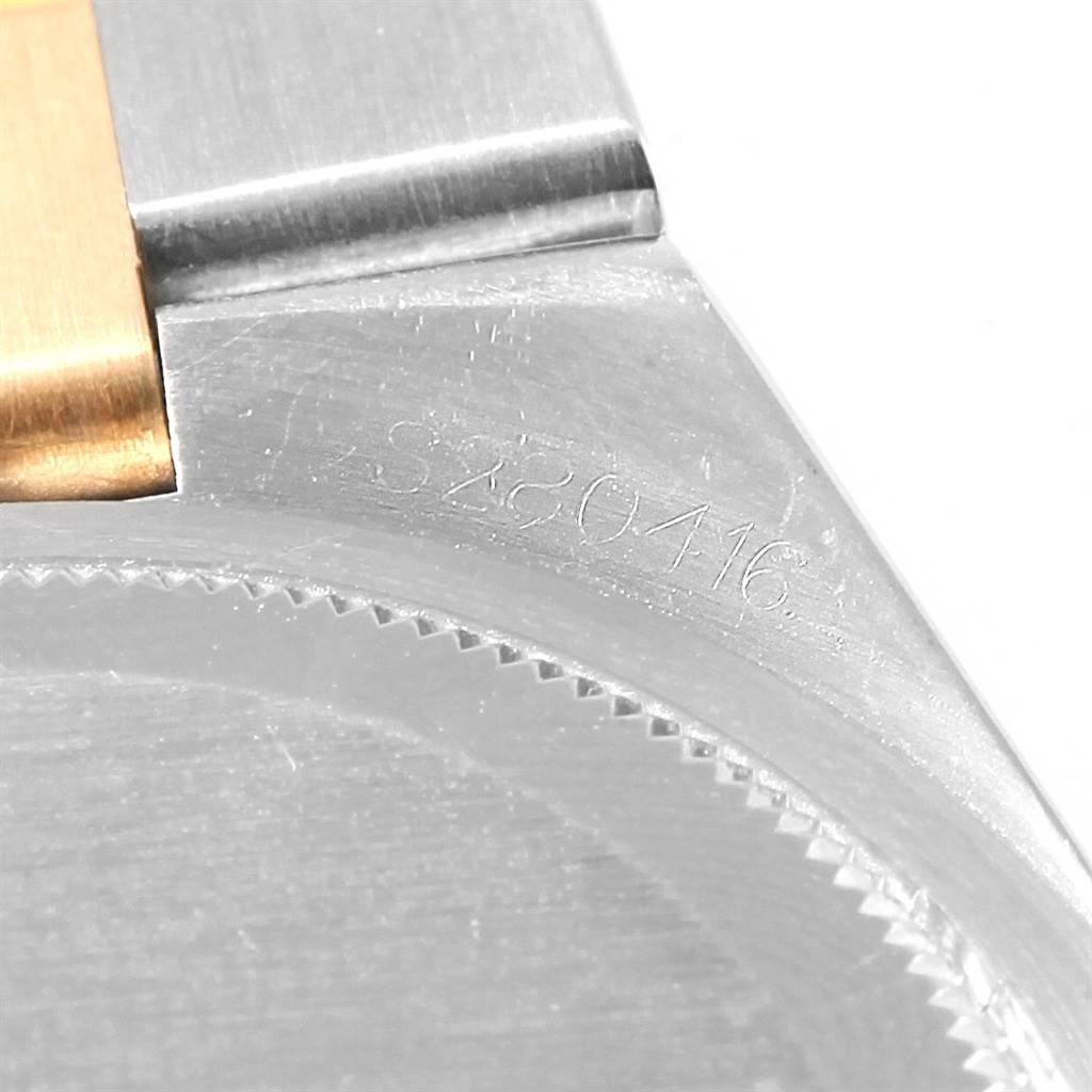 This image shows a close-up angle of the serial number area and bracelet attachment of the Rolex Oysterquartz 17013 Men's Stainless Steel Black Dial 17013 Men's Stainless Steel Black Dial model.