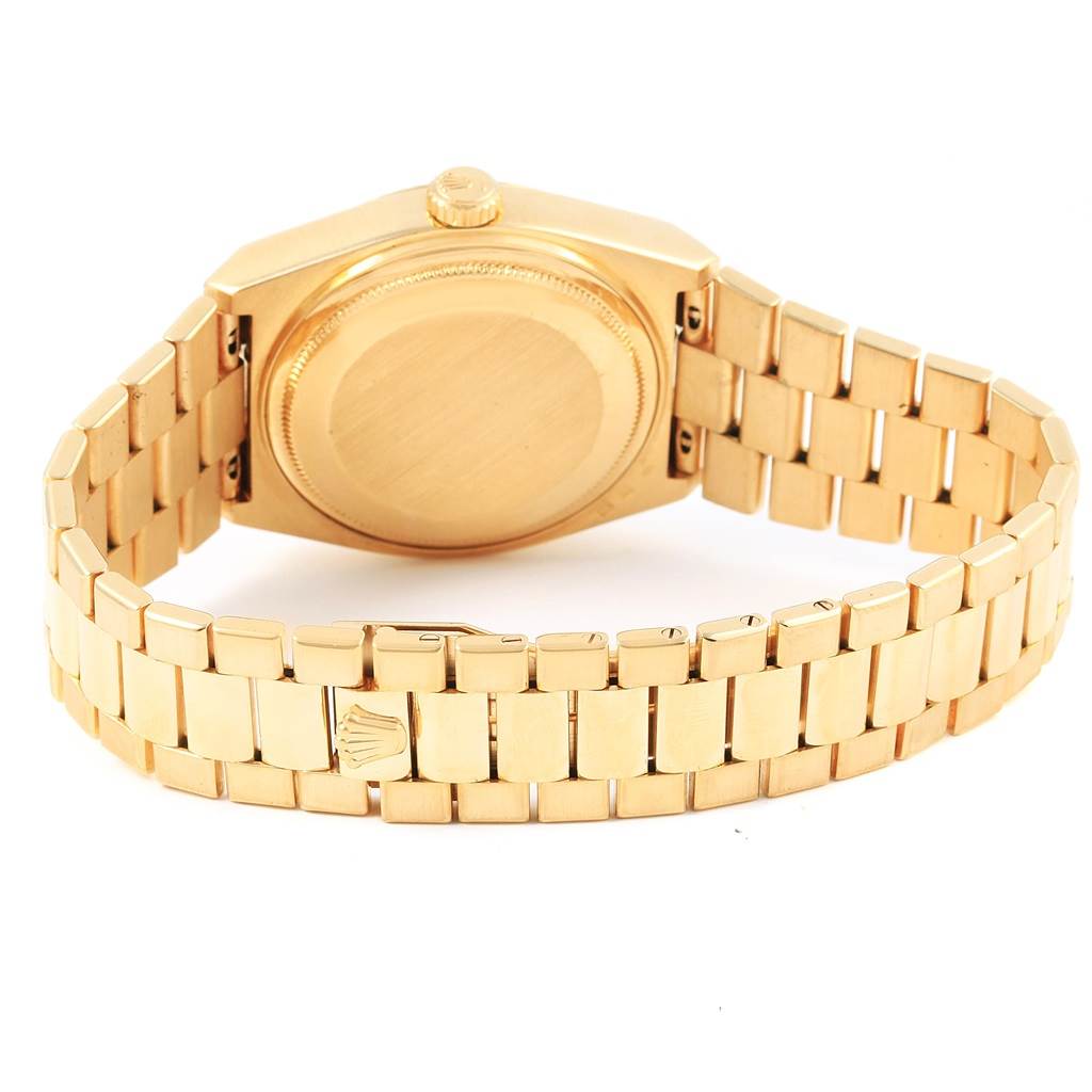 The image shows the back case and bracelet of a gold Rolex Oysterquartz 19018 Men's Yellow Gold Black Dial 19018 Men's Yellow Gold Black Dial watch from a rear angle.