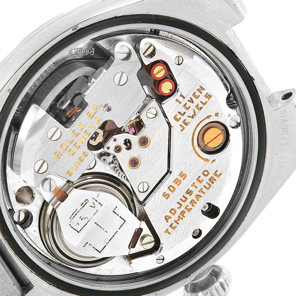This image shows the internal mechanism of a Rolex Oysterquartz 17000 Men's Stainless Steel White Dial 17000 Men's Stainless Steel White Dial, viewed from the back with components and engravings visible.