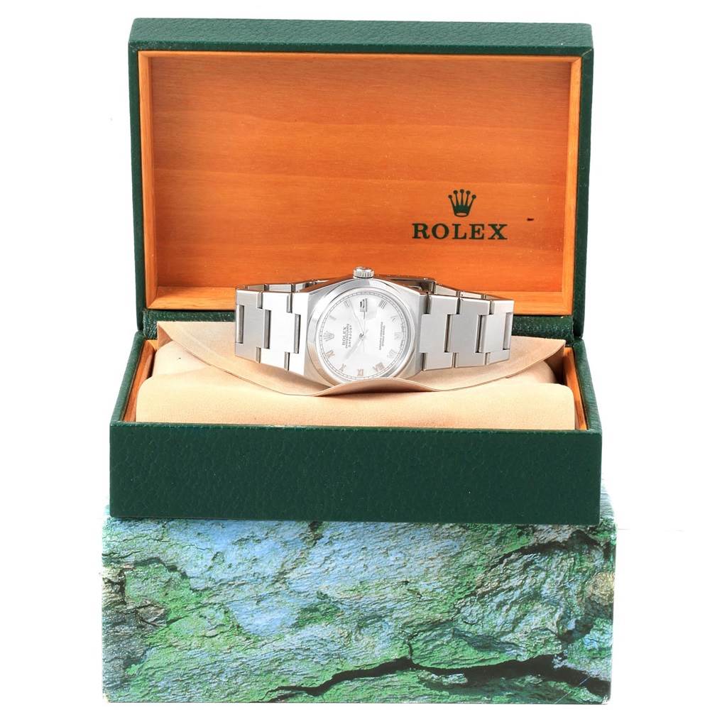 The Rolex Oysterquartz 17000 Men's Stainless Steel White Dial 17000 Men's Stainless Steel White Dial watch is displayed front-facing in an open branded box.