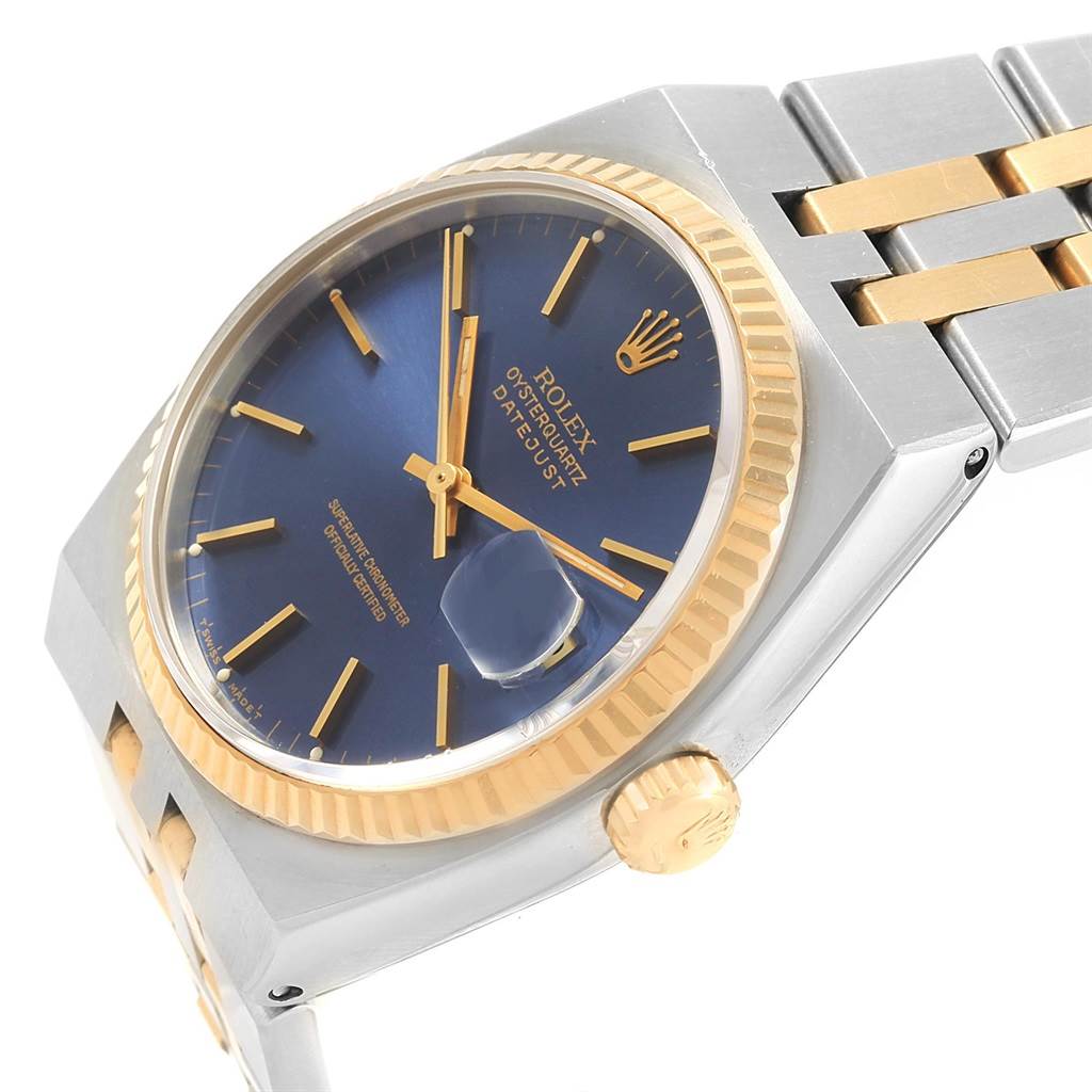 The image shows a close-up, angled view of a Rolex Oysterquartz 17013 Men
s Stainless Steel Blue Dial 17013 Men
s Stainless Steel Blue Dial Datejust watch, highlighting the bezel, crown, and part of the bracelet.