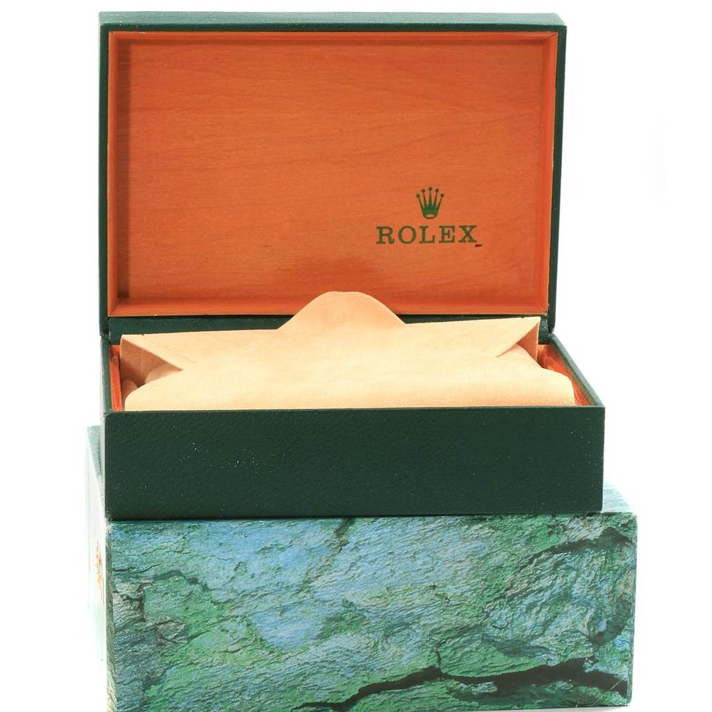 The image shows an open Rolex Oysterquartz 17013 Men
s Stainless Steel Blue Dial 17013 Men
s Stainless Steel Blue Dial watch box from a front angle with its interior visible.