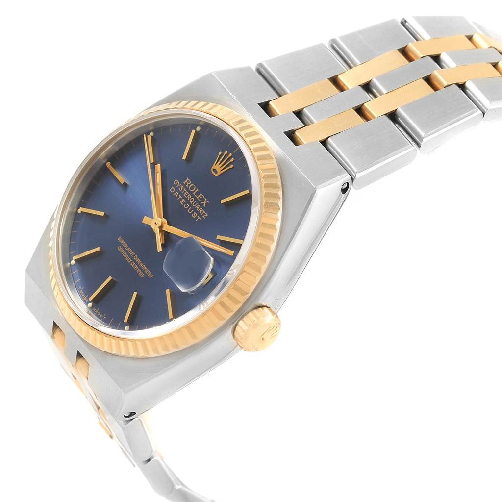 A Rolex Oysterquartz 17013 Men
s Stainless Steel Blue Dial 17013 Men
s Stainless Steel Blue Dial watch is shown at an angle displaying its face, crown, and a portion of the bracelet.