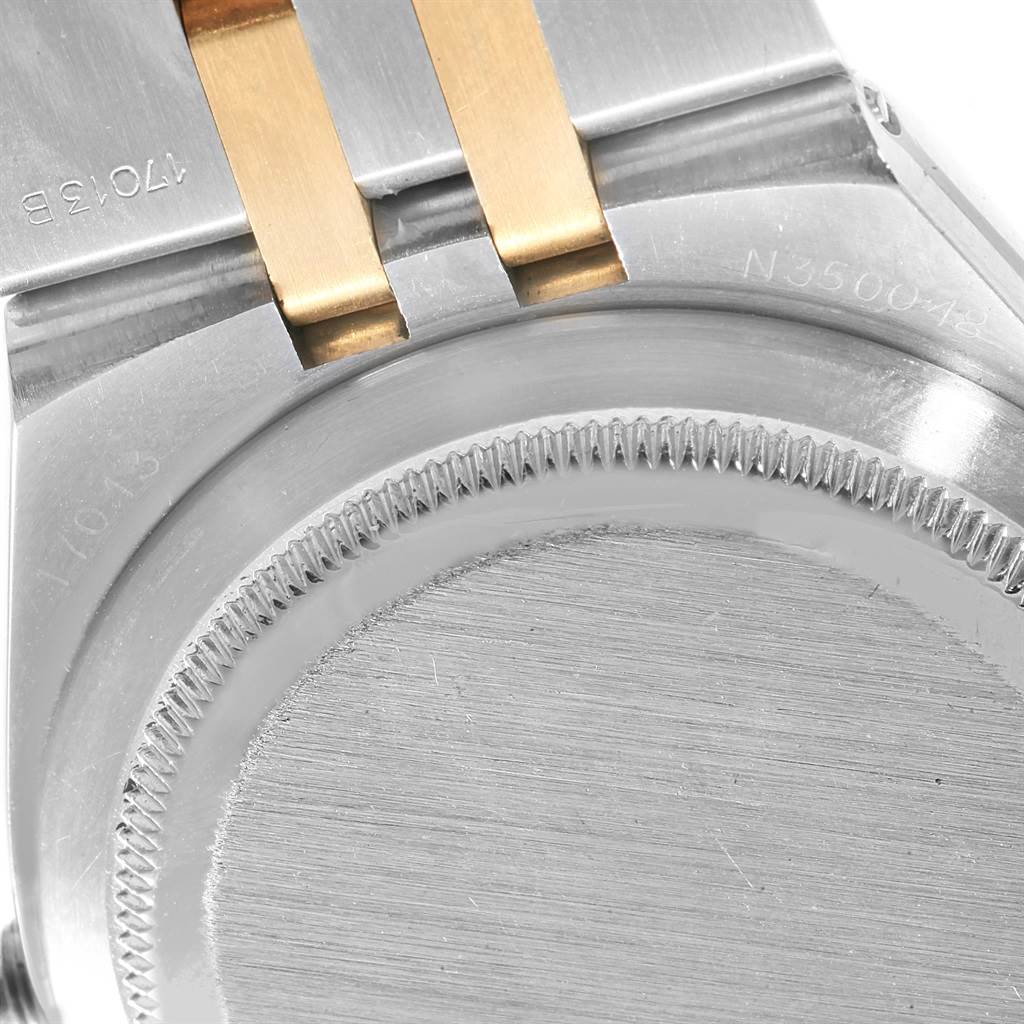 This is a close-up view of the back case and bracelet attachment of a Rolex Oysterquartz 17013 Men
s Stainless Steel Blue Dial 17013 Men
s Stainless Steel Blue Dial watch.