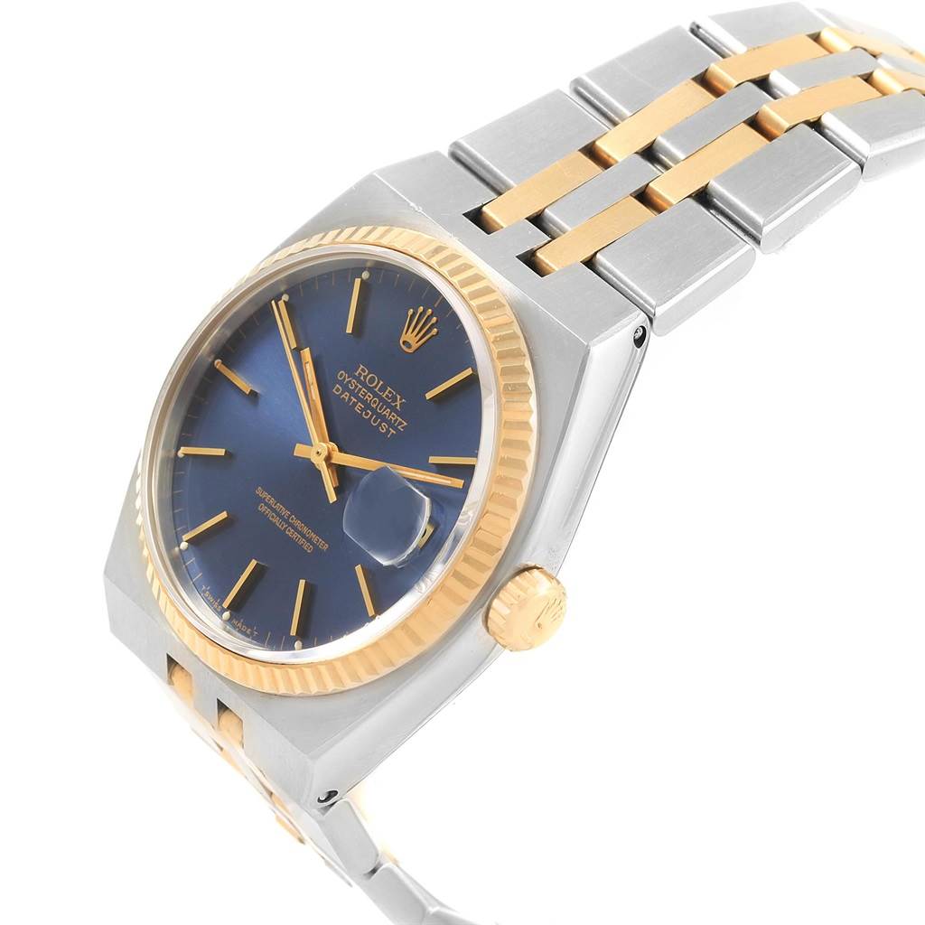 The image shows a side angle of the Rolex Oysterquartz 17013 Men's Stainless Steel Blue Dial 17013 Men's Stainless Steel Blue Dial watch, highlighting its case, dial, crown, and bracelet.