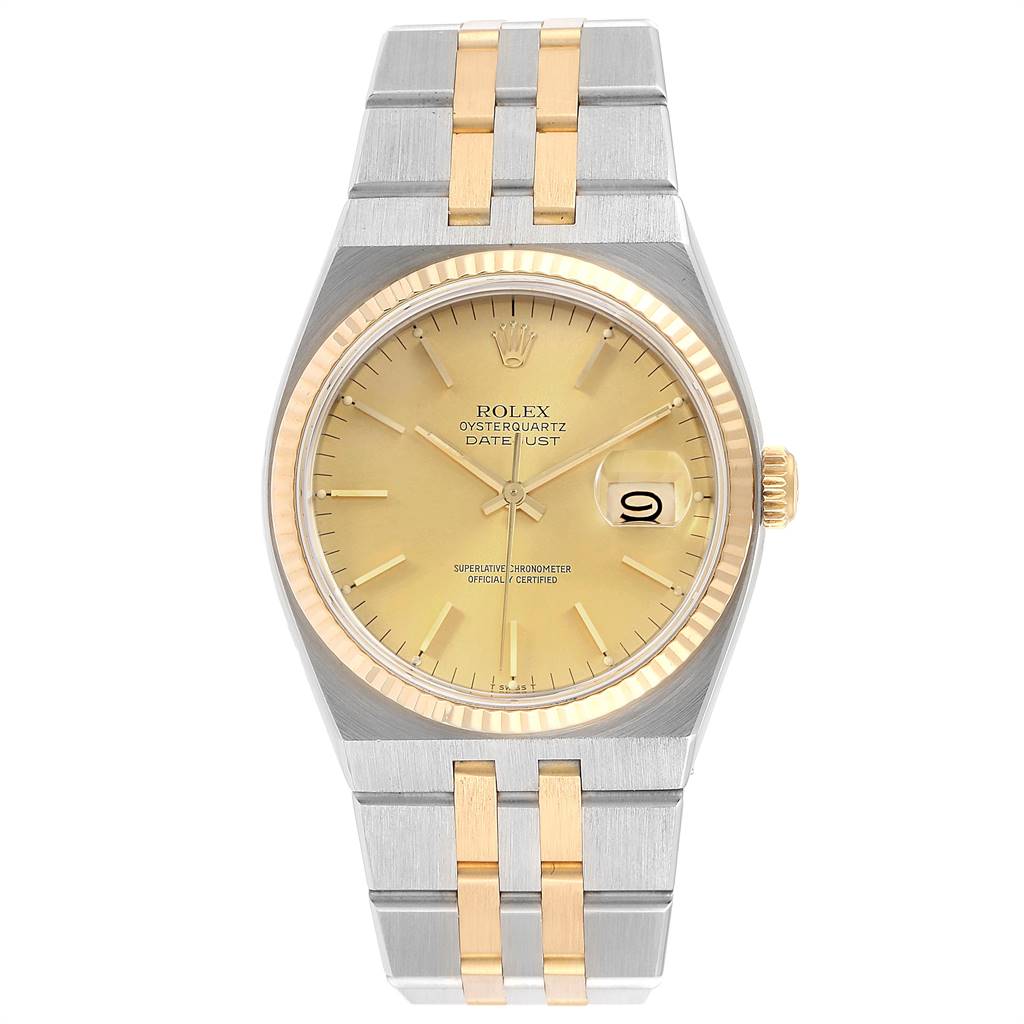The image shows a Rolex Oysterquartz 17013 Men
s Stainless Steel Champagne Dial 17013 Men
s Stainless Steel Champagne Dial watch front-on, highlighting its gold dial, date window, and two-tone bracelet.