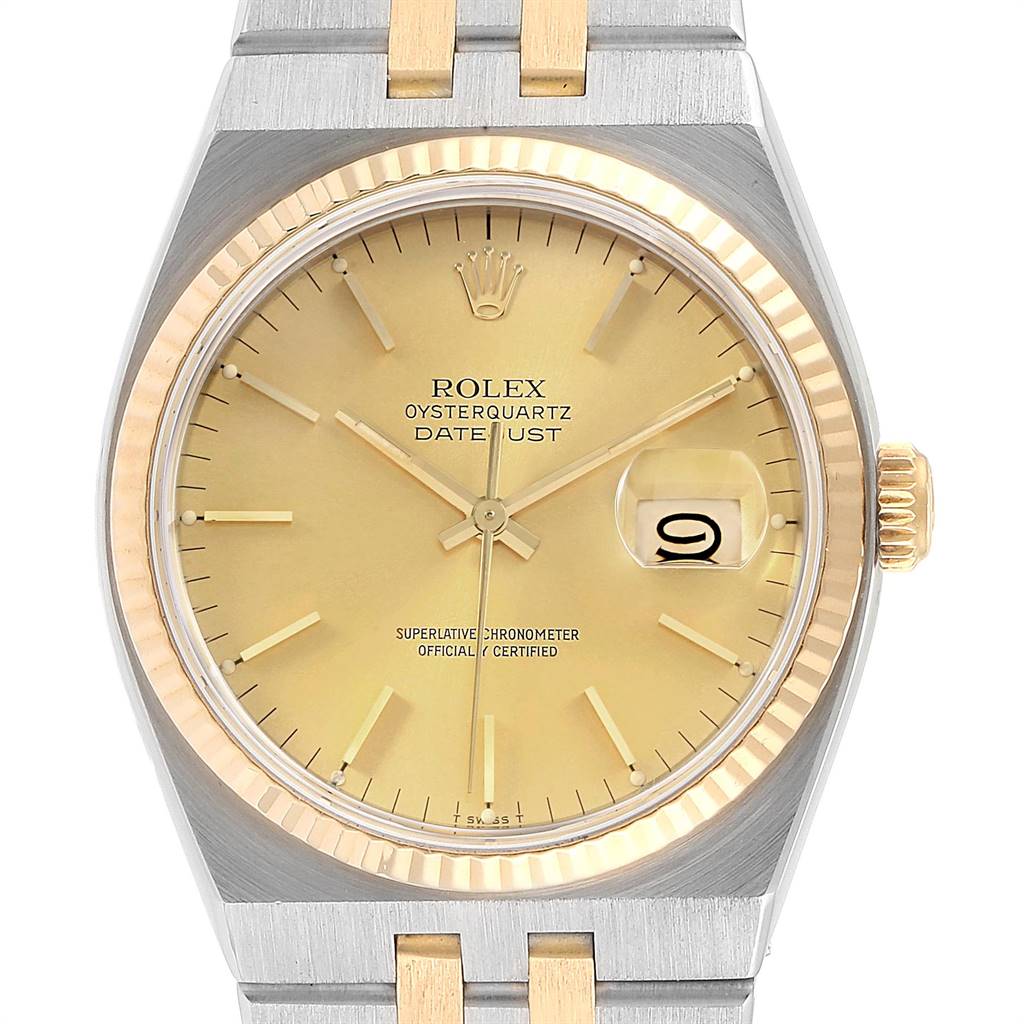 This is a close-up front view of a Rolex Oysterquartz 17013 Men
s Stainless Steel Champagne Dial 17013 Men
s Stainless Steel Champagne Dial Datejust watch showing the dial, hands, date window, bezel, and part of the bracelet.