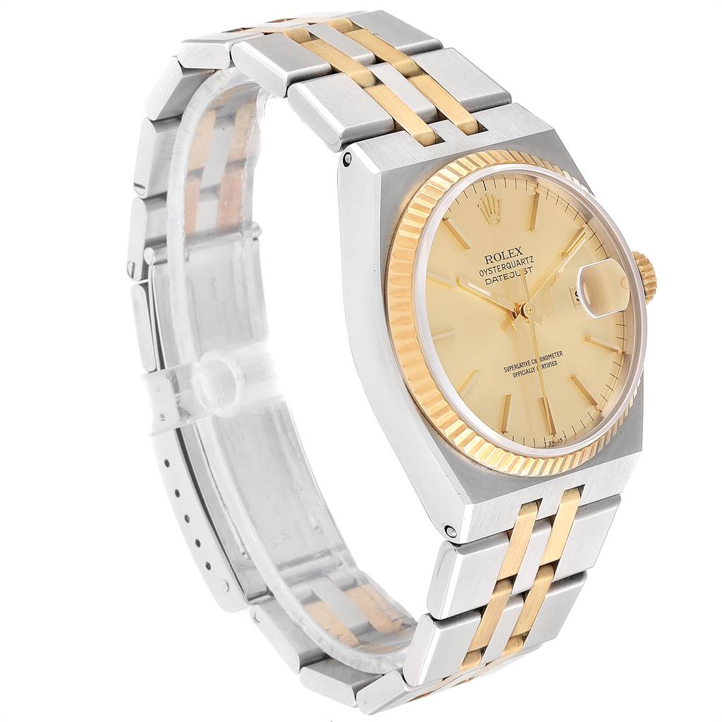 The image shows a Rolex Oysterquartz 17013 Men
s Stainless Steel Champagne Dial 17013 Men
s Stainless Steel Champagne Dial watch at a three-quarter angle, highlighting its two-tone bracelet and champagne dial.