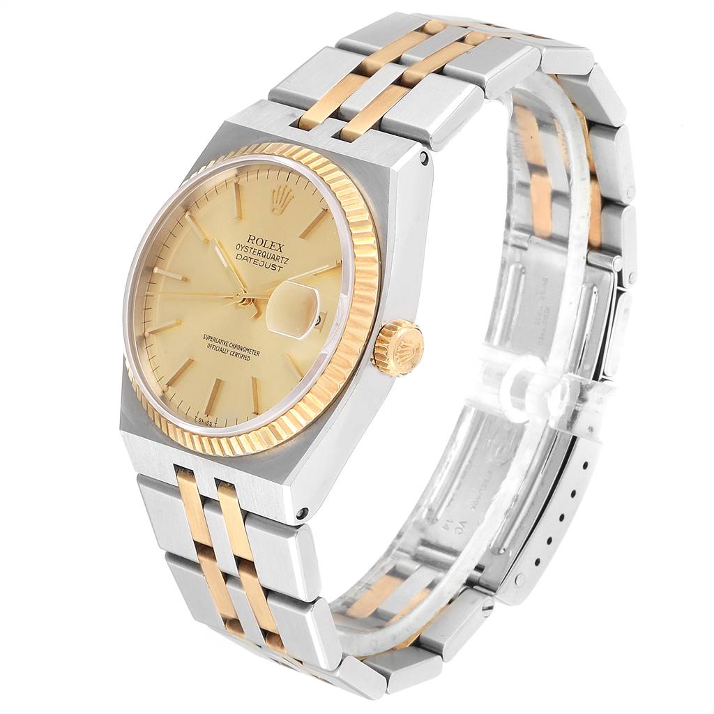 This image shows a Rolex Oysterquartz 17013 Men
s Stainless Steel Champagne Dial 17013 Men
s Stainless Steel Champagne Dial watch from an angled side view, highlighting its dial, bezel, case, bracelet, and crown.