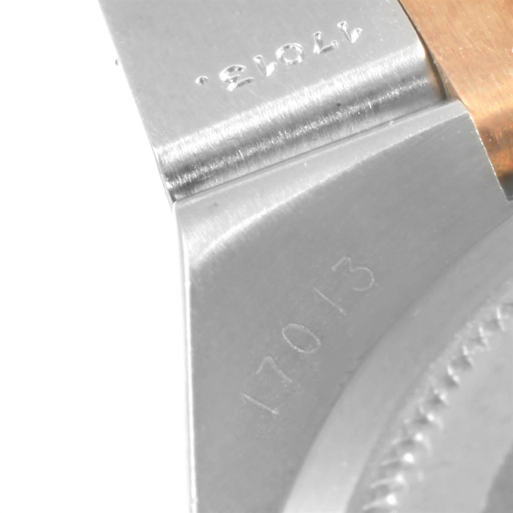 This is a close-up of the serial number and reference number on the case of a Rolex Oysterquartz 17013 Men
s Stainless Steel Champagne Dial 17013 Men
s Stainless Steel Champagne Dial watch.